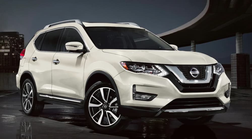 A white 2020 Nissan Rogue is shown parked.