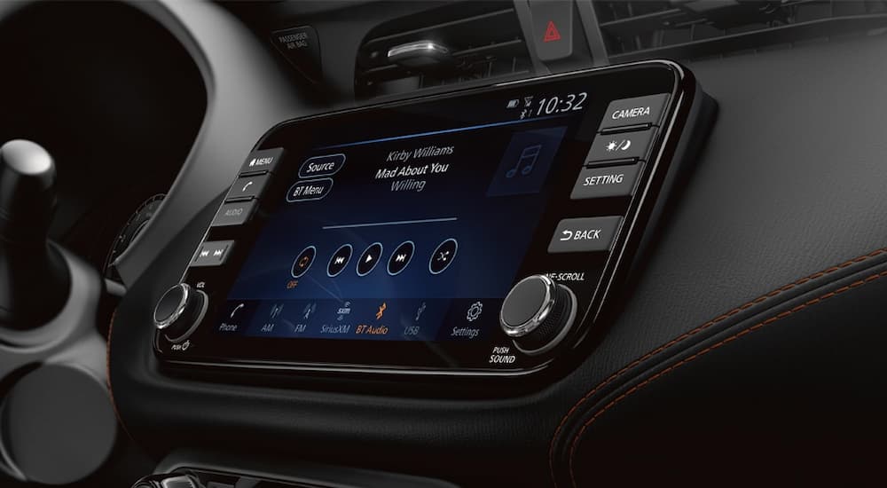 A close up of the touch screen infotainment center in a 2024 Nissan Kicks SR.