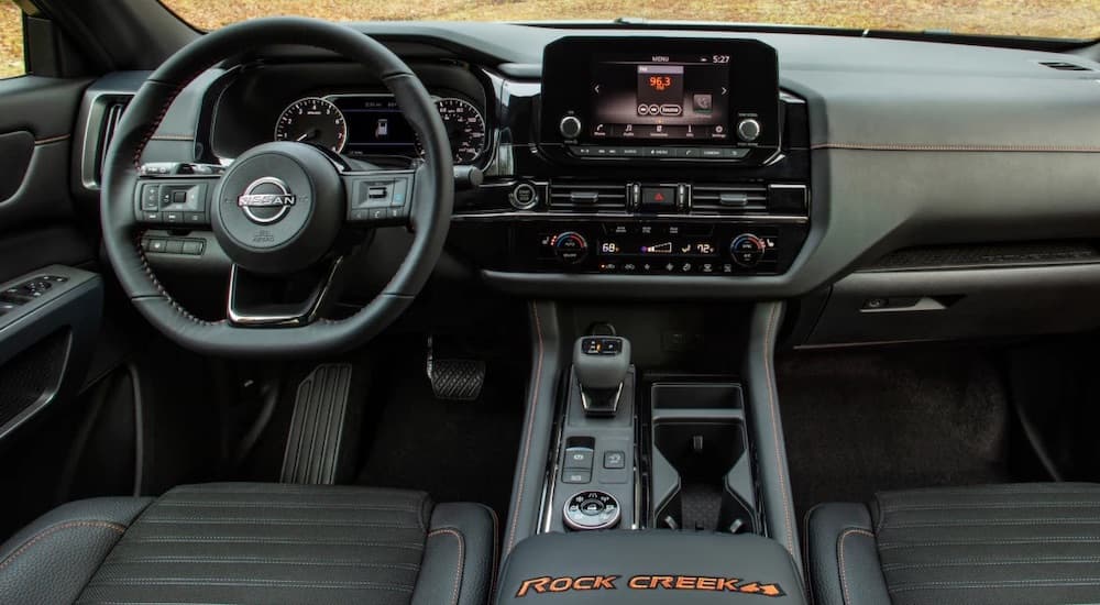 The black interior of a 2025 Nissan Pathfinder Rock Creek is shown.