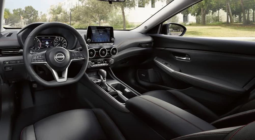 The black interior and dash in a 2025 Nissan Sentra.