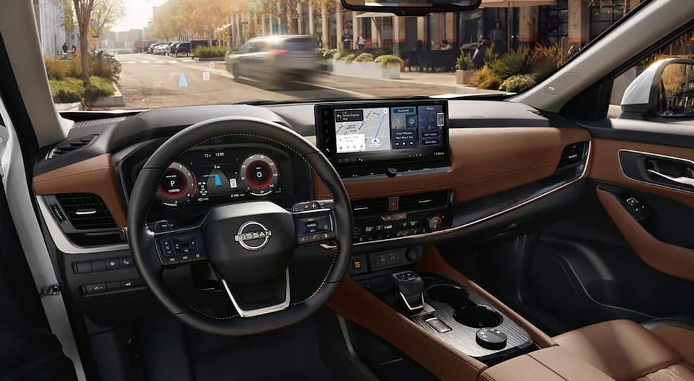 Infotainment display and dashboard inside a 2025 Nissan Rogue for sale near Oak Ridge