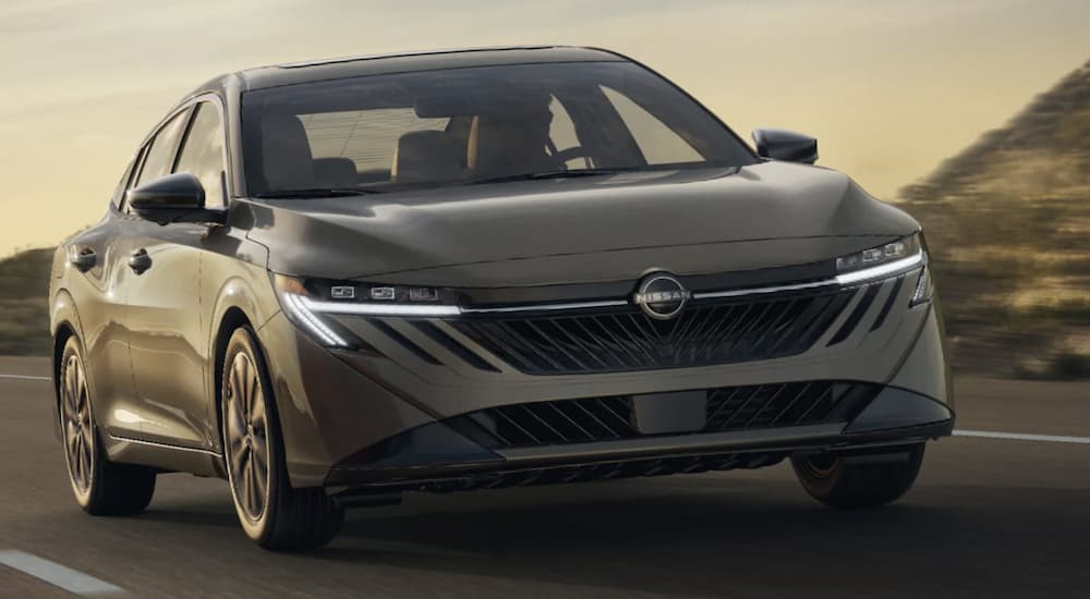 A gray 2026 Nissan Sentra driving for sale near Oak Ridge