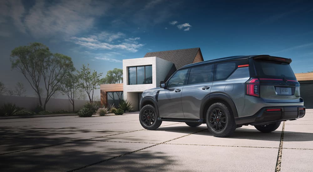 Rear of a grey 2025 Nissan Armada XL parked on a driveway.