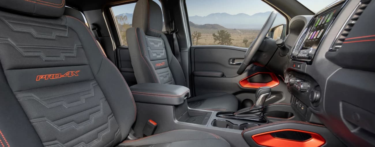 The grey interior of a 2022 Nissan Frontier PRO-4X.