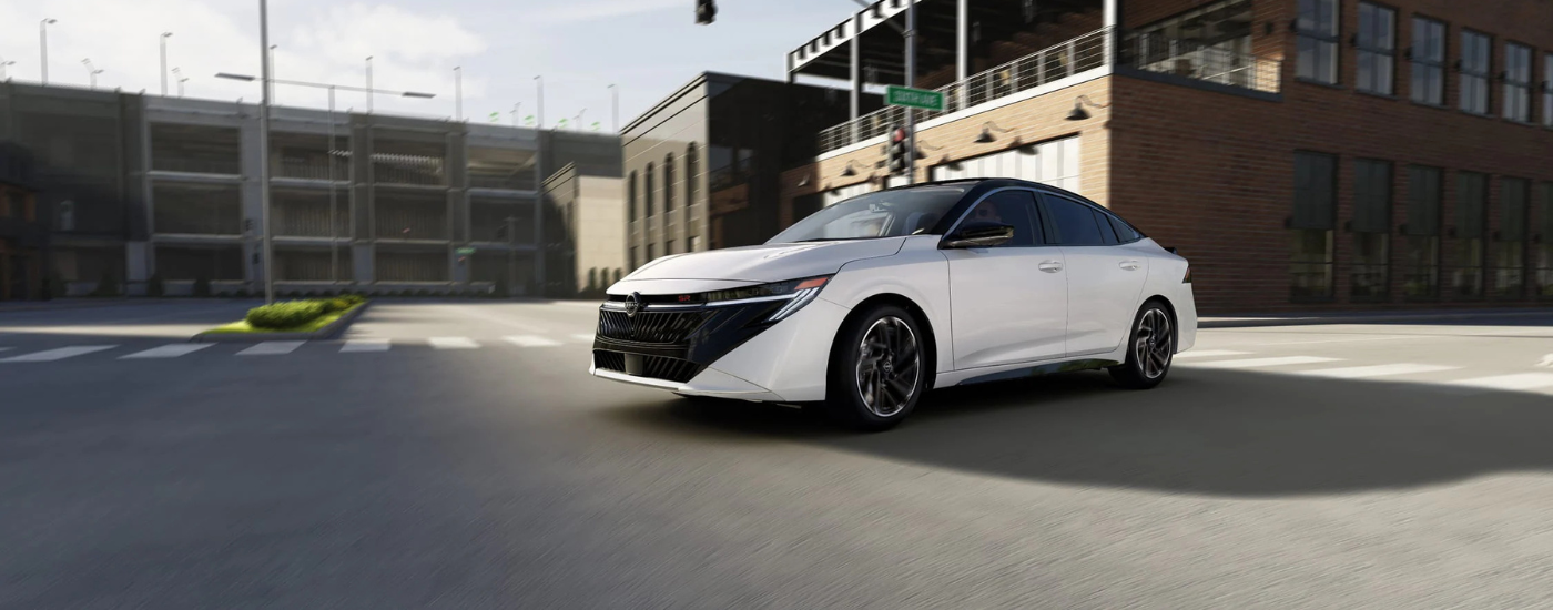 White 2026 Nissan Sentra for sale near Oak Ridge on a test drive