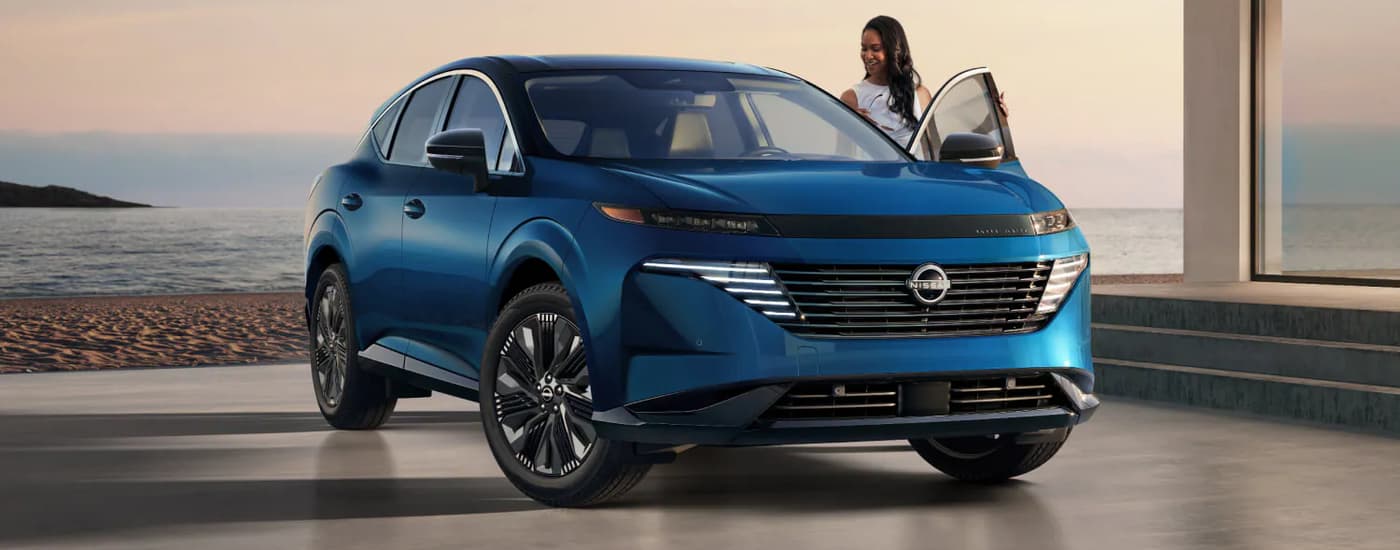 Blue 2025 Nissan Murano Platinum parked at Nissan dealer near Sevierville.